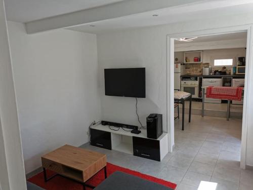 Shared lounge/TV area, Maison 47m2 a 800 m de la plage near Le Toukan