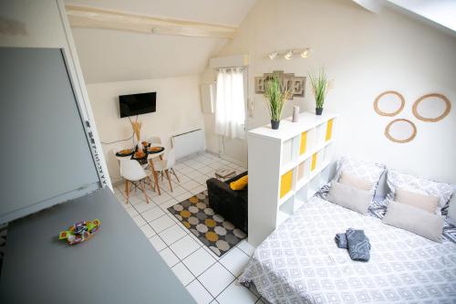 L'Evasion - coeur de ville - WIFI - Gare in Les Mureaux