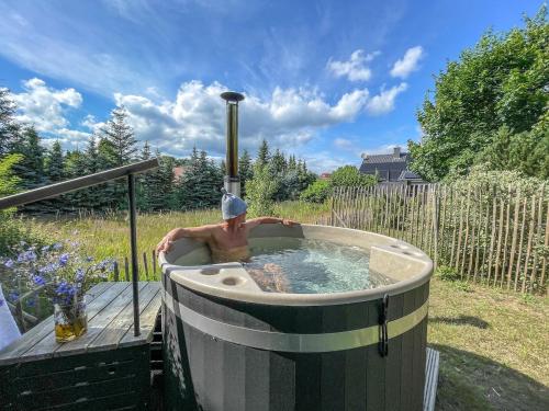 Dārzs, traumHaff - Sea Hideaway Ostsee Region - privates NORDICSPA, Kamin, Kunst, Hund 300m zum Strand in Eggesin