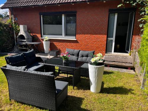Сад, Nahe Kiel, Neues Ferienhaus an der Ostsee mit Sauna,Kamin und Garten,Parkplatz,5 Betten, 3 Schlafzim in Osdorf