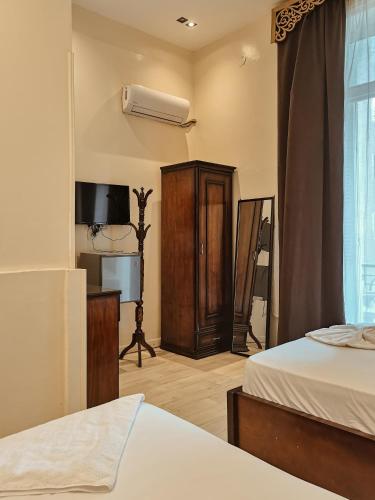 Camera tripla, balcone, 3 letti