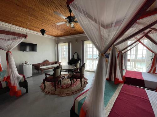 Mizingani Seafront Hotel Room Type - Deluxe Triple, Sea view
