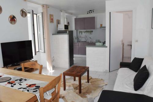 Közös társalgó / TV, Le Bangorcoo'n F3 Liouba in Le Chatelet-en-Brie