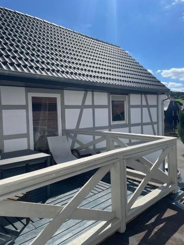 Erkély/terasz, Im Fachwerk – Wohlfühlen, Entspannen & Wandern im Grünen (Im Fachwerk – Wohlfuhlen, Entspannen & Wandern im Grunen) in Gladenbach
