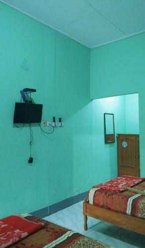 Hotel Kawsar Syariah - Tap to explore photos