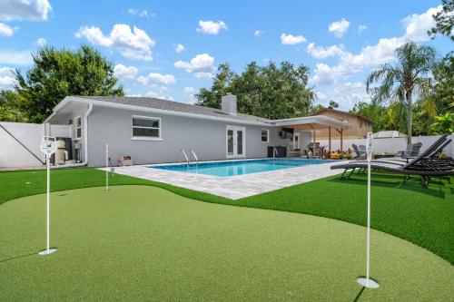 Serenity by the Sea! Cozy pool home with putting green & fire pit! in Bradenton, USA