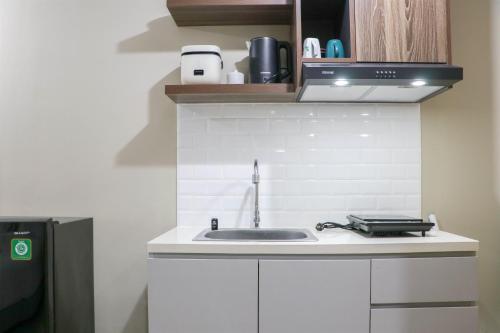 Modern Look and Homey Studio Apartment Gateway Park LRT City By Travelio Modern Look and Homey Studio Apartment Gateway Park LRT City By Travelio