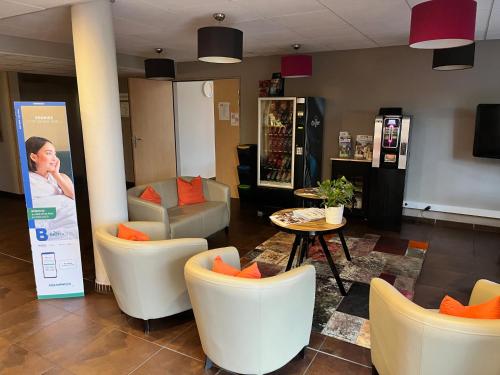 Közös társalgó / TV, Brit Hotel Confort Montauban in Montauban