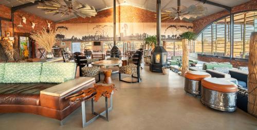 Restaurant, Okonjima Plains Camp in Otjiwarongo