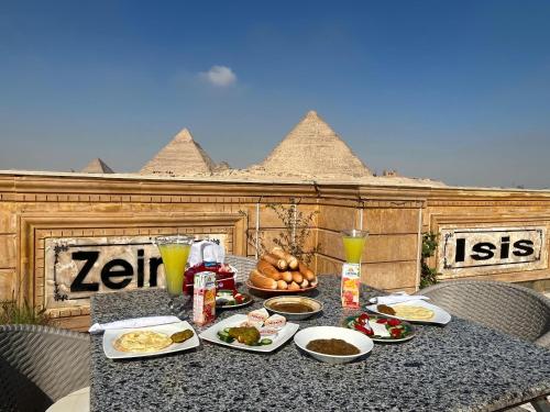 Queen Isis pyramids view