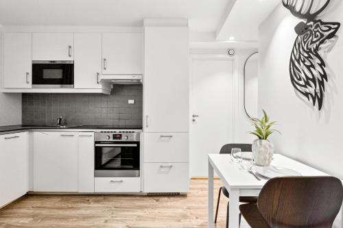 مطبخ, Pergola - Free parking - 5 min walk to facilities in Arstad