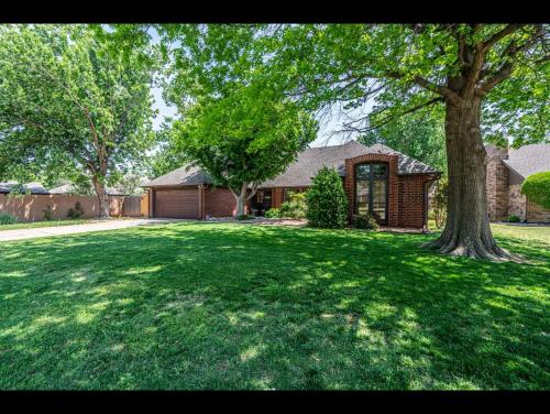 Spacious Retreat with Shaded Yard & Games home in Edmond, USA