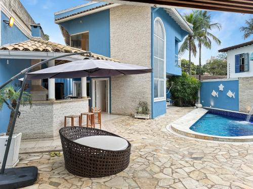 ทัศนียภาพภายนอกโรงแรม, 1 Suíte AC 50m da Praia Piscina Churasqueira (1 Suite AC 50m da Praia Piscina Churasqueira) in ตอร์ตูกา