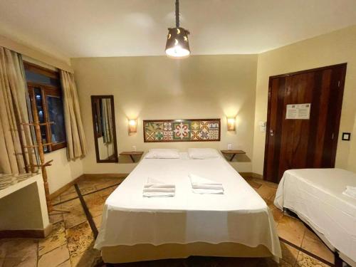 Triple Room with Balcony and Sea View image 3