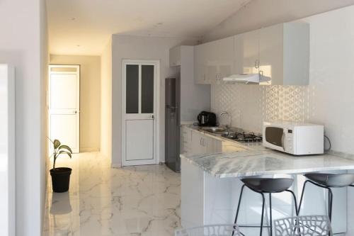 2 bdr cozy apartment in city center, Wifi - LCGR in อัสโซมาดา