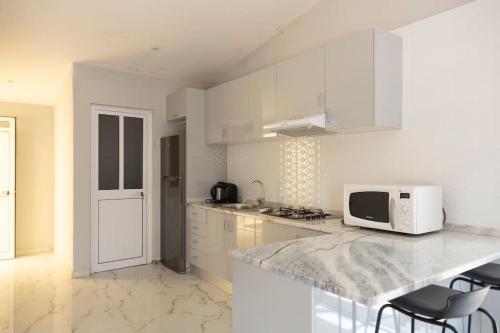 2 bdr cozy apartment in city center, Wifi - LCGR in อัสโซมาดา