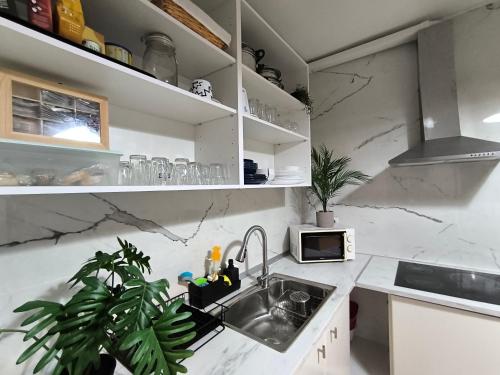 "Casa Colorá" en Sevilla ("Casa Colora" en Sevilla) in เบนาคาซอน