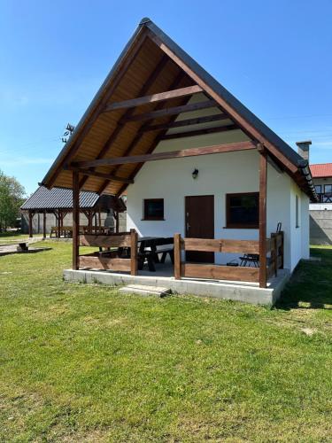 Domek letniskowy 6-osobowy całoroczny nad jeziorem Wilczyńskim, basen, jaccuzi, kajaki rowerki wodne bezpłatnie, duży plac zabaw i wiele udogodnień