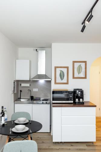 Konyha, Kleines Apartment mit Balkon in Lindleinsmuhle