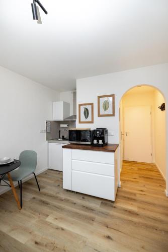 Konyha, Kleines Apartment mit Balkon in Lindleinsmuhle
