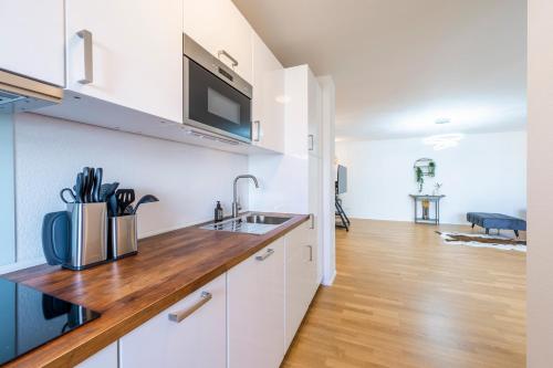 設施, EXQUIS 2BR Luxus Apartment TAO I Parken I Netflix I Garten I Familienfreundlich I in 霍爾茨格靈恩
