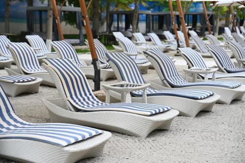 Piscina, Multi Grand Hotel in Arrinj