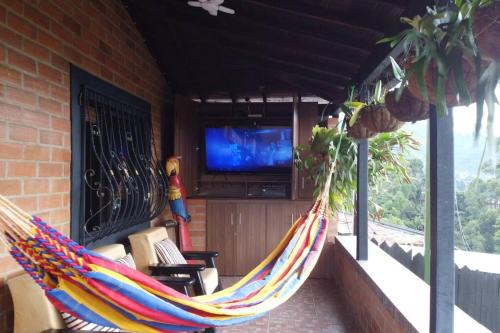 Koplietošanas atpūtas telpa ar TV, Pedacito de cielo in San Antonio de Prado