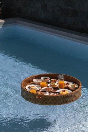 590500727 NĒRO Suites by NOMÉE Hospitality Group