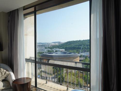 발코니/테라스, 하워드 존슨 항성 플라지 메이저우 (Howard Johnson Changsheng Plaza Meizhou) in 메이저우