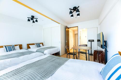 Family Room (Three Double Beds) with Kitchen - Non-Smoking - Cleaning Fee Extra