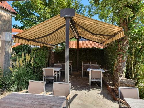 Restaurang, Hotel Pension Am Hafen in Norden