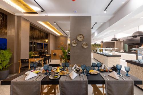 Restaurant, Eliros Mare Beachfront Poem Hotel in Gerogioupoli