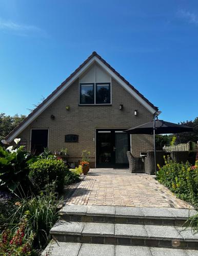  - Tulipa - Vakantiehuis nabij de bloembollenvelden, het meer en strand in Noordwijkerhout