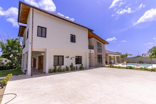 Exterior view, Luxury Beach Villa with Private Pool, Jacuzzi, Beach Club Access with Restaurant & Adventure Nearby in Peravia