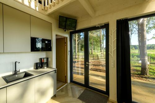 EstBerg Riverside Holiday Home in Rapina