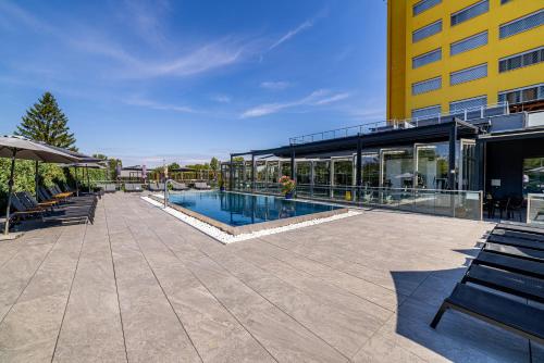 Swimming pool, Hotel Aura Prague design and garden pool in Prague 09