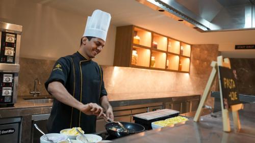 Eten en drinken, Transit by Encalm - Nap and Shower near Rajiv Gandhi International Airport