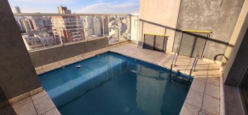 Swimming pool, Hermoso Homestudio en Nunez con Amplio balcon luminoso in Saavedra