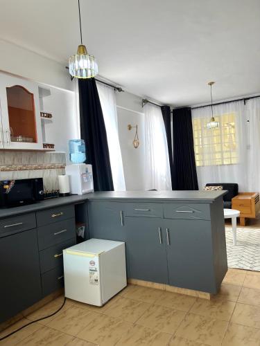 Luxury Loft Milimani - AC, WiFi, secure parking in Kisumu