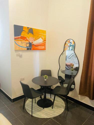 JC Studio Apartment - Tap to explore photos
