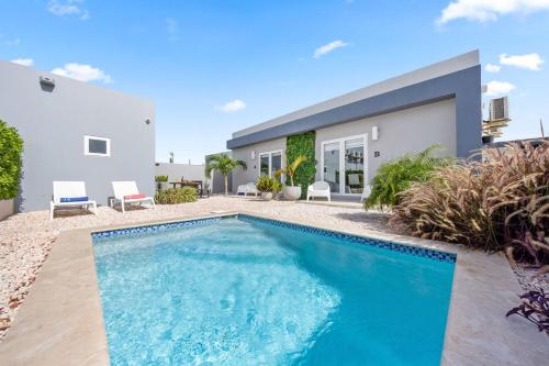 5 min Eagle Beach New Luxury 1BR w Pool & BBQ – khách sạn tại Keito