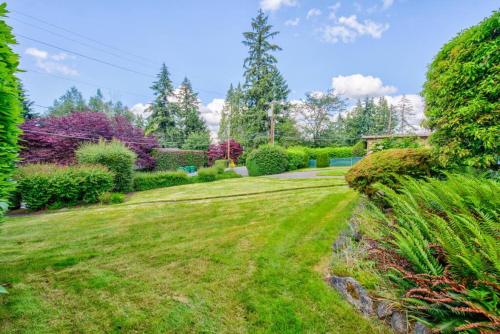 Private park in a cozy home next to I-90 huge yard