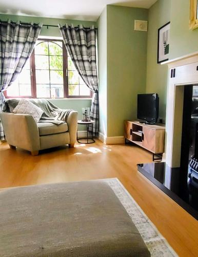 společenská místnost / TV salónek, Rynn Haven - Enchanting Townhouse Lough Rynn in Mohill