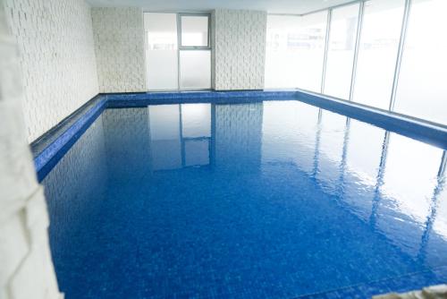 Dpto cerca de Aeropuerto con piscina y zona de trabajo