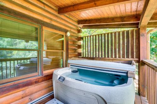 Cozy Cabin with Hot Tub Less Than Half-Mi to Douglas Lake! in Sevierville, USA