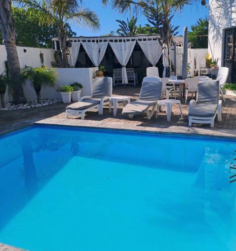 Swimming pool, Au Plais De Langebaan at Palm Tree Villa in Langebaan