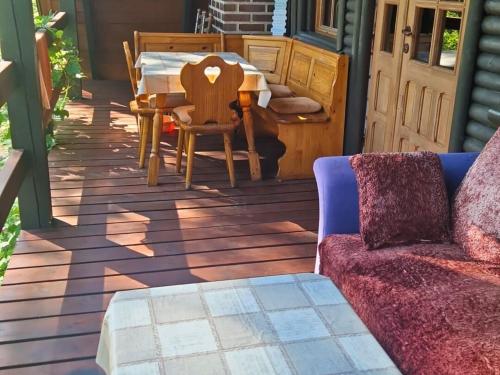 Balkons/terase, Ferienhaus Marianna am See - free Sauna, Ruderboot, Kajak & WLAN in Krživonoga