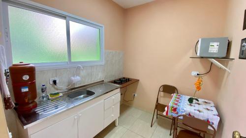 Kitchen, Casa dos Avos - Suites privativas in Campos Do Jordao