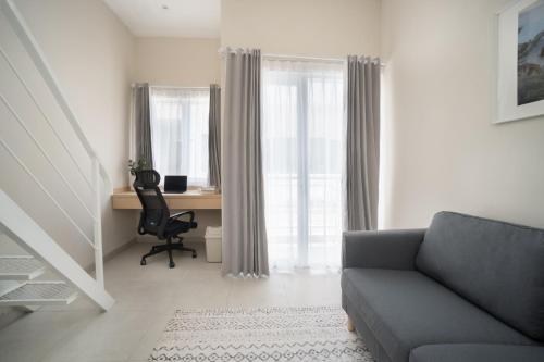 Bali Bustle Sunset Coliving and Coworking Space Room Type - Suite with Balcony