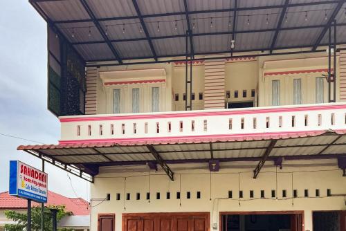 Фасада на хотела, RedDoorz Syariah @ Jalan RJ Junjungan Lubis Pandan in Aek Tolang